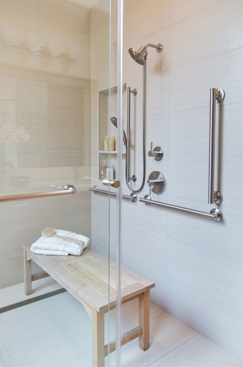 Bathroom designed for safety, ease of use while sitting, and beauty with curbless shower and grab bars. Carla Aston, Designer | Tori Aston, Photographer | #grabbars #bathroomdesign #aginginplace Walk In Shower With Bench And Grab Bars, Ada Roll In Showers, Bathroom With Grab Bars, Ada Shower Grab Bar Placement, Stylish Grab Bars Bath, Walk In Shower With Grab Bars, Shower Safety Bars, Safety Bars In Showers, Bathroom Safety Bars