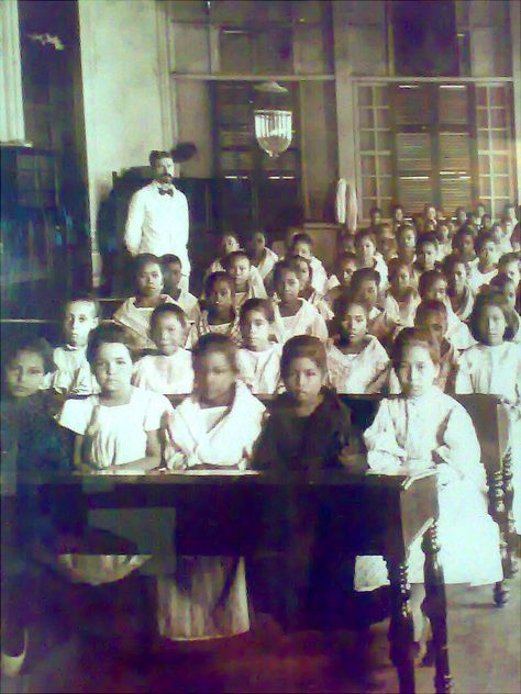 A classroom in Spanish-era Manila Philippines Spanish Era, Spanish Era Philippines Aesthetic, Filipiniana Fashion, New Manila, Filipino Heritage, Philippines Fashion, People Talk, A Classroom, Retirement Planning