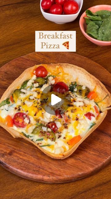 Guntas Sethi on Instagram: "✨Breakfast Egg Pizza✨

What’s better than pizza for breakfast? 🤪🍕 This is quite possibly my favorite meal this week 😋 

Crispy tortilla, juicy cherry tomatoes, and the protein from eggs🤌🏽

Recipe:

-Bell peppers, roughly chopped
-Halved cherry tomatoes
-2 eggs 
-Cheddar cheese /any other cheese of your choice
-Salt to taste
-1 tsp chilli flakes 
-1 tsp Italian seasoning 
-jalapeños/gherkins
-Baby spinach 

🍕 Bake it at 180*C for 12-15 mins or until done

#breakfastpizza #eggpizza #5minbrekkie #easybreakfastideas #quickmeals #eggetarian 

[Breakfast egg pizza, home made recipes, meal ideas, sunny side eggs, Chef Guntas]" Sunny Side Eggs, Egg Pizza Breakfast, Pizza Home, Pizza For Breakfast, Italian Eggs, Home Made Recipes, Egg Pizza, Spinach Bake, Instagram Breakfast