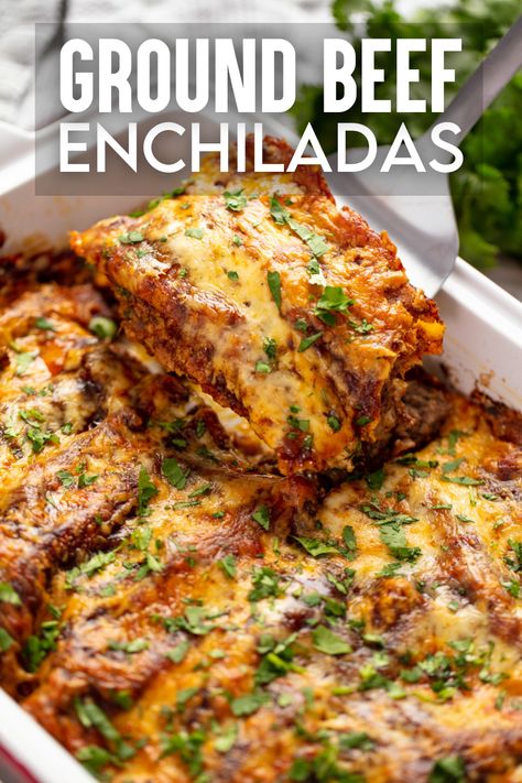 A close up view of a pan of ground beef enchiladas with a red sauce. A spatula is lifting out two of the enchiladas. Oven Enchiladas Beef, Authentic Ground Beef Enchiladas, Homemade Beef Enchiladas, Red Enchiladas Beef, Authentic Enchiladas, Dairy Free Enchiladas, Homemade Red Enchilada Sauce, Beef Enchilada Casserole, Beef Ideas