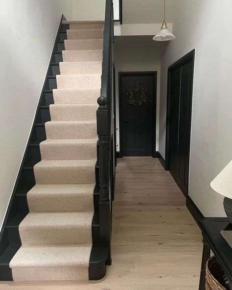 Black Painted Staircase With Runner, Oatmeal Carpet, Black Stair Treads, Hallway Wall Colors, Dark Staircase, Stairs And Hallway Ideas, Black And White Stairs, Bright Hallway, House Entryway