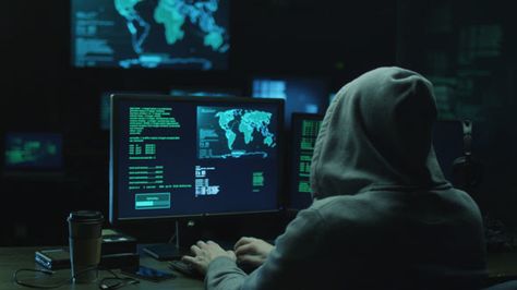 Hacker in a Hood Works on Computer with Maps and Data on Display Screens in a Dark Office (Stock Footage) Hacker Girl, Dark Office, Hacker Aesthetic, Hacker Wallpaper, Cinema Camera, Ex Machina, Web Marketing, Workout Programs, Stock Video