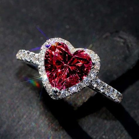 Boutique Red Heart Cz Diamond Stimulant Ring Size: 7 Material: Copper This Item Is New Includes Gift Box The Red Heart Diamond Ring Is A Stunning And Romantic Piece Of Jewelry That Captures The Essence Of Love And Passion. Crafted With Precision And Elegance, This Ring Features A Vibrant Red Heart-Shaped Stimulated Diamond As Its Centerpiece, Symbolizing Deep Affection And Commitment. The Diamond Is Delicately Set In A High-Quality, Lustrous Metal Band, Enhancing Its Brilliance And Allure. Surro Heart Shaped Diamond Ring, Heart Shaped Engagement Rings, Majlis Perkahwinan, Hari Valentine, Rings Women, Diamond Heart Ring, Single Ring, Rhinestone Ring, Heart Shaped Diamond