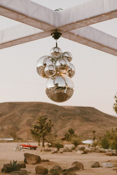 vintage wedding aesthetic film photography boho vibes disco ball desert wedding inspo joshua tree classic car wedding photography ideas Boho Desert Decor, Aesthetic Film Photography, Palm Springs Bach, Vintage Wedding Aesthetic, Classic Car Wedding, Desert Party, Disco Aesthetic, Desert Festival, Disco Decorations