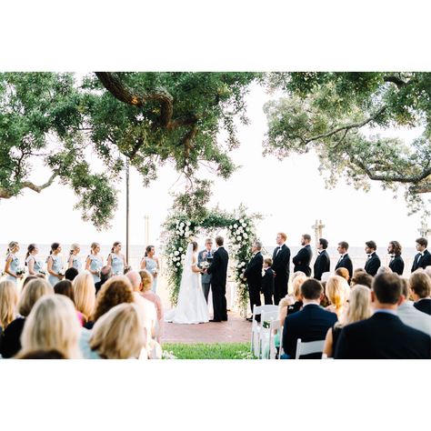 Bride and groom at alter during the ceremony. Bride And Groom Alter, Bride And Groom With Officiant, Groom Waiting For Bride At Alter, Bride And Groom At Alter, Bridal Party Sitting During Ceremony, Ceremony Pictures Wedding, Groom At Alter, Bride And Groom Ceremony, Ceremony Pictures