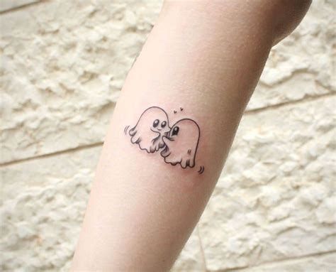 small halloween tattoos at DuckDuckGo Ghost Matching Tattoos, Ghosts Tattoo, Ghost Tattoo Ideas, Tattoos Ghost, Father Son Tattoo, Ghost Couple, Fandom Tattoos, Tattoos Couples, Typography Tattoo