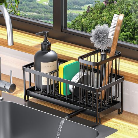 PRICES MAY VARY. 【Multifunctional Kitchen Sink Caddy】- Different from other sink caddy organizer, This sponge holder has an elongated design and a moderate width, which increases the capacity without taking up space.Very suitable to be placed behind the sink. Comes with Tall brush holder, allowing flexible placement of kitchen brushes, sponges, dish soap dispensers, sink stopper and more. Keep your kitchen clean and tidy. A kitchen storage essentials for kitchen sink countertop decor. 【Self Drai Cute Kitchen Gadgets, Kitchen Sink Organization Top Of, Sponge And Soap Holder Kitchen, Kitchen Soap Dispenser Ideas, Condo Aesthetic, Soap Holder Kitchen, Dish Brush Holder, Organize Kitchen Sink, Kitchen Soap Holder