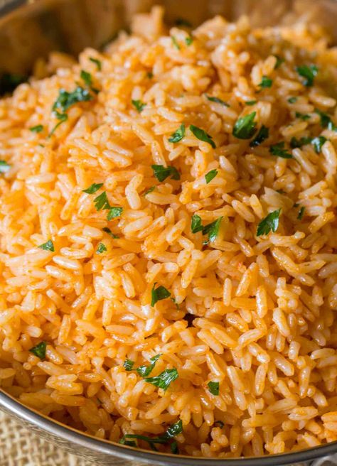 I made this with basmati rice. It was good. I lessened the chicken broth by 1/4 c. Spanish Rice Recipe Easy, Authentic Mexican Rice, Spanish Rice Easy, Cajun Rice, Spanish Rice Recipe, Dinner Then Dessert, Mexican Rice Recipes, Fluffy Rice, Arroz Frito