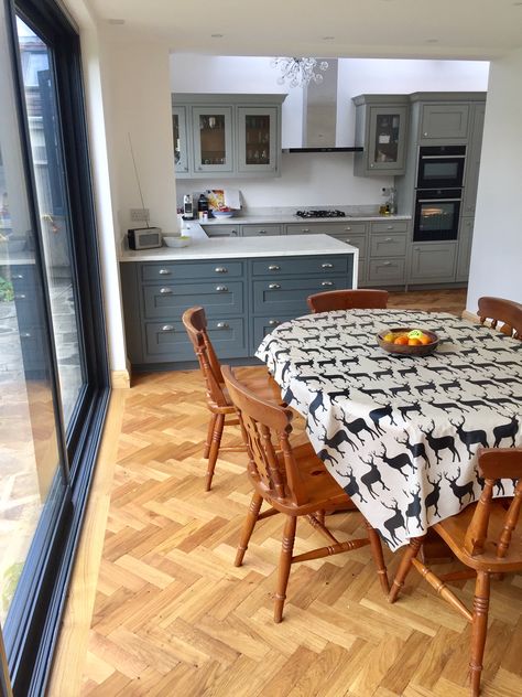 Langton Burbidge kitchen, gravel, seal grey/ peninsular/ marble quartz waterfall worktop/ parquet floor Waterfall Worktop, Budget Renovations, Birch Kitchen, Kitchen Printables, Island Storage, Kitchen Island Storage, Open Plan Kitchen Diner, Parquet Floor, Handleless Kitchen