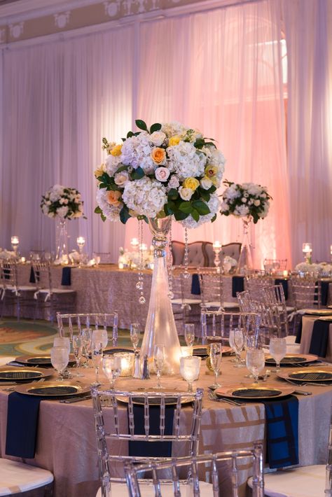 An Elegant Navy and Gold Wedding  via TheELD.com Blush Pink And Navy Blue Centerpieces, Navy Rose Gold And Champagne Wedding, Navy And Blush Reception, Blush Pink And Navy Blue Wedding Tables, Blush Pink And Navy Blue Wedding Reception Decor, Pink And Navy Wedding Decorations, Dusty Rose And Navy Blue Wedding Theme Wedding Table Decor, Rose Gold And Navy Blue Wedding Theme Wedding Table Decor, Blush And Navy Wedding Decorations