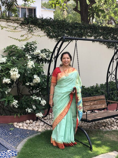 When the MD of Kankatala, Mallik, steps out on a Sunday morning outing with wife Silpa, it calls for a special saree, handpicked by the husband for his dear wife... Silpa looks radiant in the pretty sea green handwoven cotton Paithani with the elaborate mor(Peacock) motifs on the pallu. The picture was taken in their well-maintained garden that Silpa personally takes care of. . #kankatalafamily #paithani #cottonsaree #saree #kankatala Cotton Paithani Saree, Muniya Paithani Saree, Sarees Ideas, Draped Sarees, Dear Wife, Saree Styling, Peacock Motifs, Mom Wardrobe, Paithani Saree