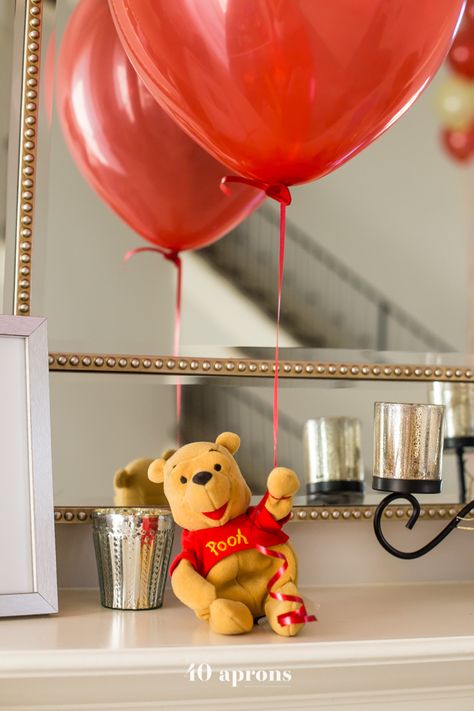 This DIY Winnie the Pooh birthday party is too cute! With tons of Winnie the Pooh birthday party ideas, this is your Winnie the Pooh birthday party guide. Happy birthday, little one! It'd make a great Winnie the Pooh baby shower, too. Diy Winnie The Pooh, Baby Shower Winnie The Pooh, Winnie The Pooh Birthday Party, Pooh Birthday Party, 40 Aprons, Baby Shower Pictures, Winnie The Pooh Themes, Pooh Birthday, Bear Birthday Party