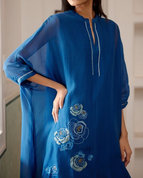 Make a statement at your next celebration with the Sapphire Applique Co-ord Set in a deep blue hue. Featuring intricate floral embroidery and delicate applique blooms, paired with matching pants, making it a perfect blend of elegance and comfort for your gatherings. Shop our new arrivals for festivities big and small on vaayu.co.in Jewellery- @_ingy @mina.jaipur #VaayuClothing #Pre- festive #ShopNow Applique Kurta, Kurta And Pants, Asymmetric Kurta, Stylish Kurtis Design, Applique Work, Fancy Kurti, Kaftan Style, Kurti Embroidery Design, Embroidered Pants