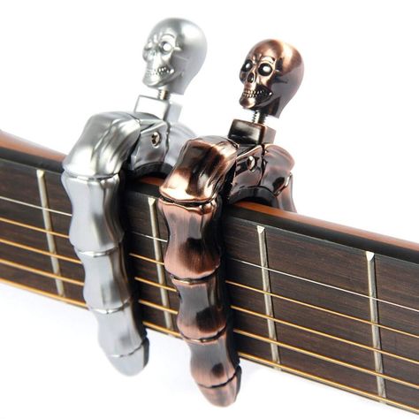 OriginMainland China Use:Change tone  Suitable for:Guitar,Electric Guitar,Ukulele  Color:Silver, Bronze, Golden, Black.syi Strings Instrument, Guitar Capo, Bass Ukulele, Unique Guitars, Classic Guitar, Guitar Neck, Guitar Shop, Guitar Accessories, Guitar Pedals