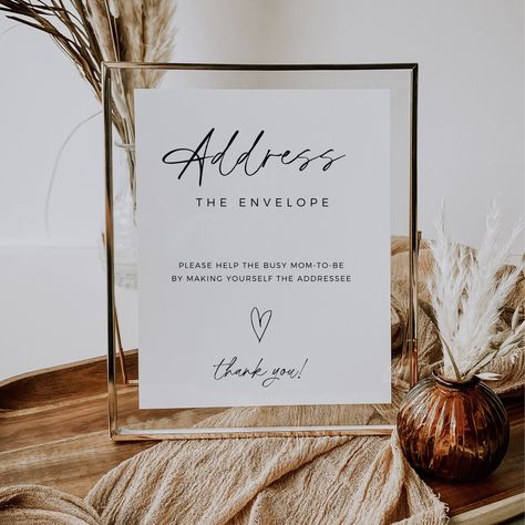 "EVERY PURCHASE COMES WITH A FREE 7 PAGE WEDDING CHECKLIST Also, please enjoy 60% off this item when you copy and paste the link below. https://lovelanepress.ck.page/discountcode -------------- DESCRIPTION -------------- Make your baby shower truly special with our modern minimalist \"address the envelope\" baby shower sign. This fully editable template puts the creative control in your hands, allowing you to customize every detail to match your unique style. Embrace the elegance of the modern minimalist design as you prepare to celebrate the upcoming shower. With this template, you can effortlessly create a chic and personalized sign that will add a touch of sophistication to your event. Let your creativity shine and craft an envelope addressing station that will leave a lasting impressio Neutral Baby Shower Decor, Baby Shower Signage, Shower Flowers, Envelope Addressing, January Wedding, Baby Shower Sign, Shower Sign, Baby Shower Decor, Boho Baby Shower