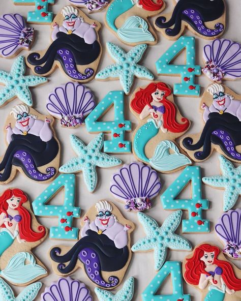 Petite Sweet on Instagram: “For a four year old who loves Ursula as much as Ariel!  #littlemermaidcookies #littlemermaidbirthday #decoratedcookies #royalicingcookies…” Ursula Cookies Decorated, Ursula Birthday Party Ideas, Ursula Party, Ariel Cookies, Mermaid Treats, Villain Party, Disney Villain Party, Villains Party, Mermaid Cookies