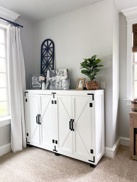 I gave one of my favorite pieces a much needed revamp 😍🙌🏻I love this this storage cabinet and I love that it holds ALL the things. I teamed up with Purdy to revamp her and I couldn’t be happier! I just shared the free plans and details on how I finished it on our site. Modern Farmhouse Storage, Diy Modern Farmhouse, Farmhouse Storage Cabinets, Farmhouse Storage, Modern Farmhouse Diy, Farmhouse Cabinets, Shanty 2 Chic, Wooden Storage Cabinet, Diy Storage Cabinets