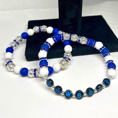 Experience awesomeness! Introducing Dallas Cowboy Football Bead Bracelets - Handcrafted Fan Accessories, available now at an amazing price of $10.00 #SportsJewelry #DallasCowboys #AcrylicBeads #StretchyBeads #SilverFiligreeBead #PolymerClayBeads #TeamSpirit #BlueWhiteSilver #TexasBracelets #FashionJewelry Cowboy Football, Dallas Cowboy, Sports Jewelry, Dallas Cowboys Football, Cowboys Football, Fan Accessories, Bead Bracelets, Polymer Clay Beads, Silver Filigree