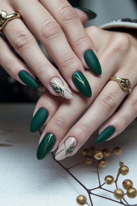 Embrace the beauty of autumn with these stunning olive green nails featuring delicate maple leaf designs. This chic style perfectly captures the essence of fall, blending rich green tones with warm, earthy accents. Whether you鈥檙e heading to a harvest festival or just want to celebrate the season, this look is both artistic and sophisticated. Get inspired by these fall nail ideas and elevate your nail game! Green Bridal Nails, Sage And Gold Nails, Olive Green Nails Designs Fall, Earthy Green Nails, Green Fall Nail Designs, Nail Art Vert, Green Fall Nails, Herbst Nails, Olive Green Nails