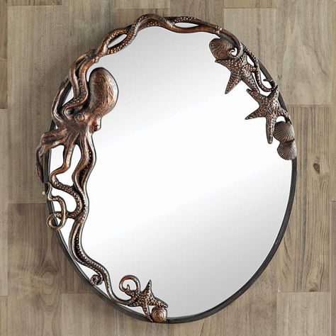 PRICES MAY VARY. 60 Day No Hassle Returns Exclusive - Cast iron sculptural details in a bronze finish. This coastal mirror measures 21 1/2"W x 2"D x 26"H. Coastal Mirrors, Octopus Decor, Mermaid Bathroom, Spiegel Design, Farmhouse Side Table, Coastal Bedrooms, Oval Wall Mirror, Length Mirror, A Mirror