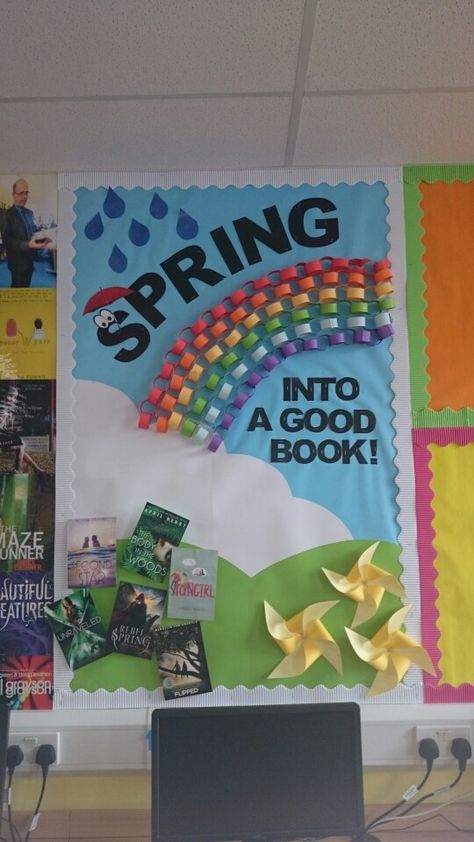 Spring into a good book :) Spring Into A Good Book Bulletin Board, Spring Library Book Displays, April Library Bulletin Board Ideas, Spring Library Bulletin Board Ideas, Spring Library Displays, Book Bulletin Board, School Library Bulletin Boards, Hallway Decorations, Library Corner