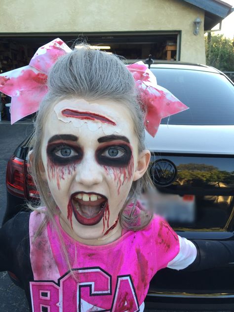 Zombie Cheerleader makeup!! Zombie Cheerleader Costume Makeup, Diy Zombie Cheerleader Costume, Zombie Doll Makeup, Cheerleader Zombie Makeup, Scary Cheerleader Makeup, Cheerleader Makeup Halloween, Zombie Cheerleader Makeup For Kids, Zombie Kids Makeup, Zombie Make Up For Kids