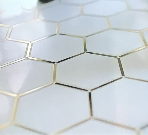 This might be the ultimate for hexes! Gold Trimmed White Hexagon Tile #whytile White Hexagon Tile Floor, Gold Tiles Bathroom, White Hexagon Tile Bathroom, White Hexagon Tile, Hexagon House, Hexagon Tile Bathroom, White Hexagon Tiles, Hexagon Tile Floor, Gold Tile