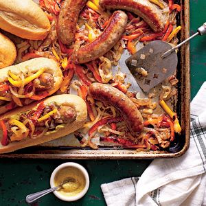 Sheet Pan Suppers from 'Southern Living' ~ Bratwurst with Peppers and Onions Recipe ~ If you're lucky enough to have leftovers, wrap hoagies in foil, and reheat in a 350° oven for 15 minutes. Sausage Dinners, Pork Dinners, Bratwurst Recipes, Recipes Southern, Sheet Pan Suppers, Fresh Salmon, Spring Dinner, One Dish Dinners, Pork Tacos