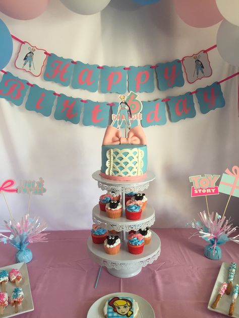 Dessert table for birthday party inspired by Toy Story character Bo Peep. Displayed are cake and cupcakes. Bo Peep Party Ideas, Bo Peep Cake Birthday, Dessert Table For Birthday, Bo Peep Birthday Party, Bo Peep Party, Bo Peep Cake, Toy Story Birthday Cake Girl, Table For Birthday Party, Girly Toy Story Party