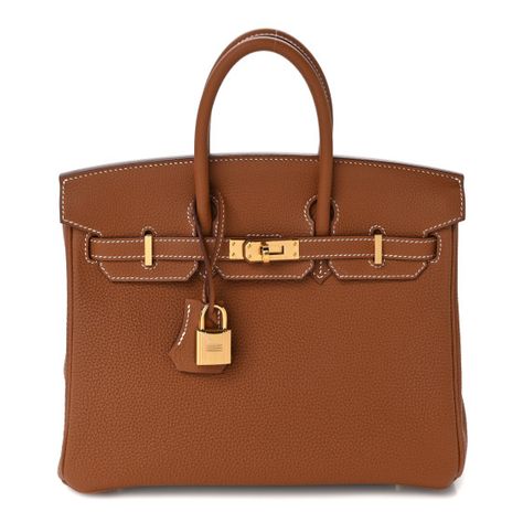 This is anauthentic HERMES Togo Birkin 25 in Gold. This classic handbag is beautifully crafted of togo calfskin leather in golden brown. The bag features rolled leather top handles, a short front flap and strap closure, and gold-plated hardware including a padlock and keys inside a leather clochette. This opens to a goatskin leather interior with zipper and patch pockets. Brown Birkin Bag, Brown Birkin, Hermes Birkin Brown, Birkin 25 Gold, Hermes Birkin Gold, Birkin Collection, Birkin Bags, Dream Bag, Kelly Bag