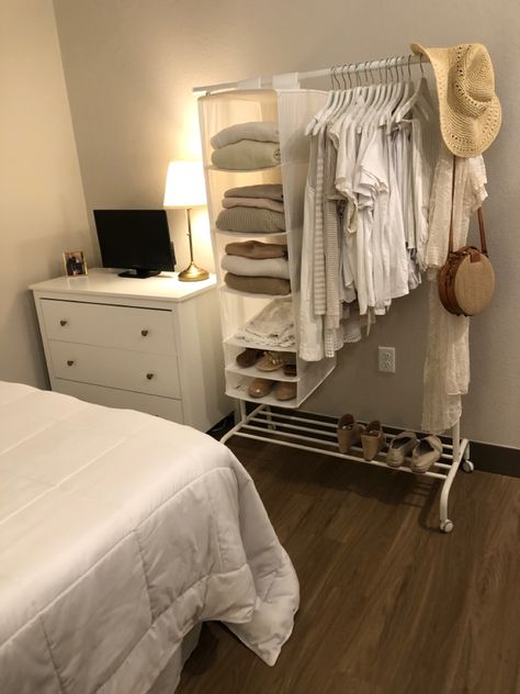 Apartment Clothes Organization, Bedroom Ideas With Clothes Rack, Clothing Rack Storage Ideas, Closet Small Apartment, Exposed Clothes Rack, Hanger Rack Bedroom, Extra Small Bedroom Ideas Space Saving, Clothing Rack In Small Bedroom, Small Bedroom Ideas No Closet