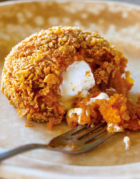 These inside-out sweet potatoes turn the iconic sweet potato casserole into irresistible nuggets of Thanksgiving goodness. Sweet Potato Balls Recipe, Sweet Potato Balls, Potato Balls Recipe, Sweet Potatoes With Marshmallows, Potato Balls, Stuffed Potato Balls, Thanksgiving Recipes Side Dishes, Balls Recipe, Mashed Sweet Potatoes