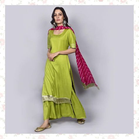 Looking for quirky, offbeat mehendi outfits that is sure to set you apart from the rest? Worry no more! TWB's new collection has everything… Parrot Green Suits Women Indian, Green Suit Women, Green Kurti, Silk Kurti Designs, Sharara Designs, Combination Dresses, Indian Kurti Designs, Mehendi Outfits, Parrot Green