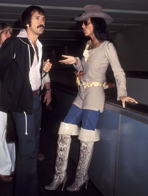 Cher, 71, Has Been Wearing Bell Bottoms and Wacky Hats to the Airport for More Than 40 Years 70s Cher, Cher 70s, Cher Fashion, Cher And Sonny, Cher Outfits, Jet Set Style, Look 80s, Cher Bono, Cher Photos