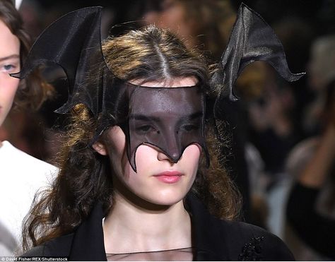 The feted French fashion house's first female artistic director added a hint of gothic with the addition of sheer, bat-like eye masks Bat Fashion, Dior Spring 2017, Christian Dior Gowns, Hanging Leaves, Feminist Slogan, Bat Mask, Dior Gown, Floral Headdress, Bat Costume