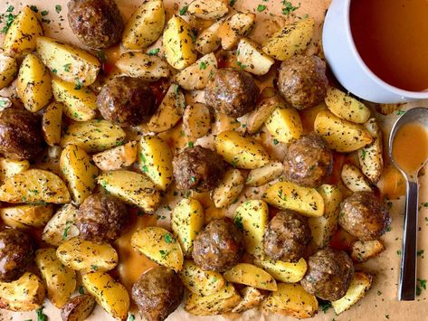 Meatballs and Potatoes on a parchment paper lined baking sheet with a bowl of gravy Sheet Pan Meatballs, Potatoes And Meatballs, Meatballs And Potatoes, Easy Pasta Dinner Recipes, Hamburger And Potatoes, Juicy Meatballs, Ground Beef And Potatoes, Easy Pasta Dinner, Pan Dinners