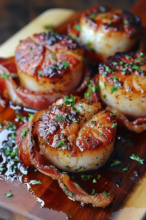 Indulge in a delectable dish with this bacon-wrapped scallops recipe. These savory bites are guaranteed to be a hit at your next gathering. The combination of crispy bacon and tender scallops creates a perfect blend of flavors that will leave your taste buds longing for more. Whether you're hosting a dinner party or simply looking to impress your loved ones with something special, these bacon-wrapped scallops are sure to be a crowd-pleaser. Smoked Bacon Wrapped Scallops, Bacon Wrapped Scallops Grilled, Bacon Wrapped Scallops In Oven, Scallops Wrapped In Bacon, Broiled Scallops, Scallops With Bacon, Bacon Wrapped Scallops Recipe, Soup Recipes Easy, Scallops Recipe