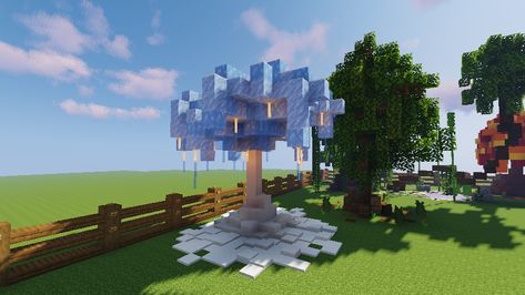 LET IT SNOW ! ICE TREE IN MINECRAFT . Build yours NOW! Ice Path Minecraft, Ice Tree Minecraft, Minecraft Snow Decorations, Ice Kingdom Minecraft, Minecraft Ice Sculpture, Snow Build Minecraft, Minecraft Ice Village Ideas, Ice Spikes Minecraft, Minecraft Ice Spikes House