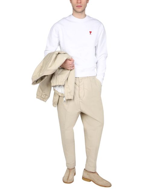 BUTTON CLOSUREBELT LOOPS AT THE WAISTTWO SIDE POCKETSTWO FLAP BACK POCKETS PENCES100% COTTONMODEL IS 185 CM TALL AND WEARS SIZE LGender: MenMaterial: MAN COTTON TROUSERSColor: BEIGEMade in: PTProduct ID: HTR101_220250*Import tax/duty will be calculated at checkout (If applicable) Carrot Fit Pants, Ami Alexandre Mattiussi, Alexandre Mattiussi, Cotton Trousers, Workout Pants, Khaki Pants, Trousers, Outfit Inspo, Pants