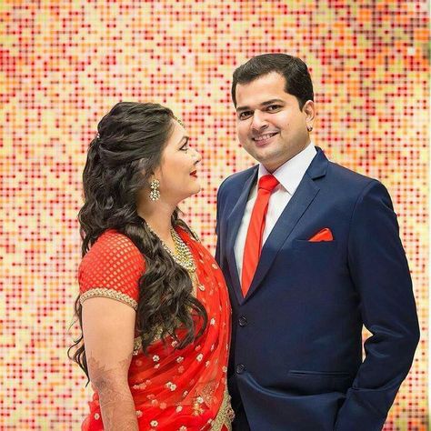 Traditional red embroidered floral lehenga for the gorgeous punjabi bride and navy blue suit for the Malayali groom customised for their difference in taste in style at ❤ The Dress Shop Couple Clothing, Floral Lehenga, Punjabi Bride, Navy Blue Suit, Blue Suit, Beautiful Bride, Bridal Wear, Lehenga, In Style