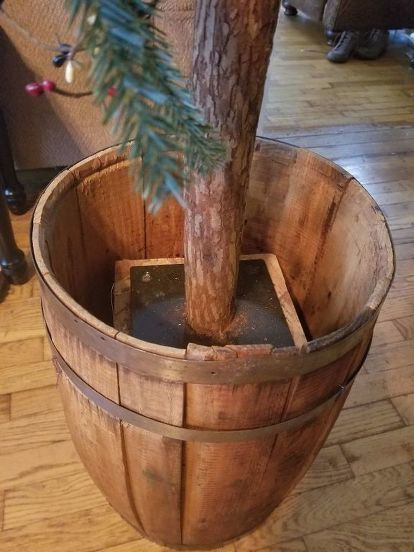 Christmas Tree In Whiskey Barrel, Christmas Barrel Decor, Whiskey Barrel Christmas Decor, Church Christmas Party, Primitive Christmas Decor, Christmas Tree Base, Barrel Decor, Cozy Christmas Decor, Tree Base