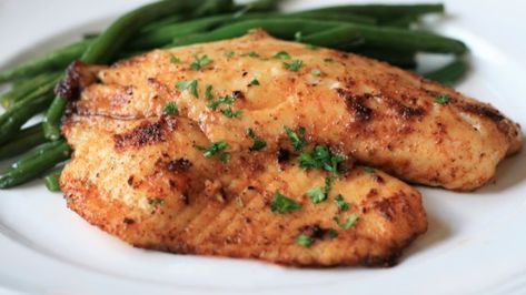 Tilapia fillets are marinated in a simple, flavorful mixture before they're grilled to perfection in this easy recipe. Tilapia Fillet Recipe, Grilled Tilapia Recipes, Tilapia Fillet, Tilapia Dinner, Fillet Recipes, Fish Aesthetic, Fried Tilapia, Grilled Tilapia, Tilapia Recipe