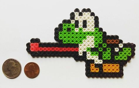 Yoshi Perler Bead | Perler bead art, Perler beads, Perler bead patterns Mario Perler Beads, Hama Beads Mario, Perler Bead Mario, Perler Ideas, Pixel Art Templates, Perler Bead Templates, Perler Crafts, Melting Beads, Iron Beads