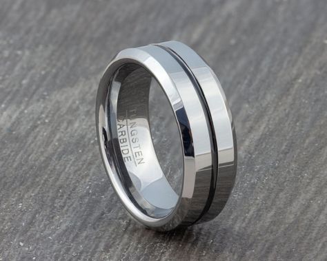 Mens 8mm Tungsten Ring with Grey Groove - Silver Wedding Band - Womens & Mens Engagement, Promise Ring - Sizes N 1/2 to Y Vincent Faith Jewellery This luxury tungsten carbide ring is 8mm wide, with a polished finish and is a true statement piece. The ring is a comfort fit so if you are looking for a very comfortable ring that will stand out this is the ring for you. With a polished grey centre line running around the outer side of the ring & polished silver edges, this design has true di Titanium Mens Wedding Ring, Silver Wedding Band, Black Tungsten Rings, Black Wedding Band, Tungsten Mens Rings, Titanium Wedding Rings, Faith Jewelry, Mens Engagement, Tungsten Carbide Rings