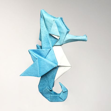 Origami Seahorse design and fold by Ryan Dong. Folded from a square piece of paper. Paper Sculpture Easy, Origami Seahorse, Paper Pin, Dog Insurance, Diagram Design, Origami Art, Paper Goods, 3d Art, Paper Art