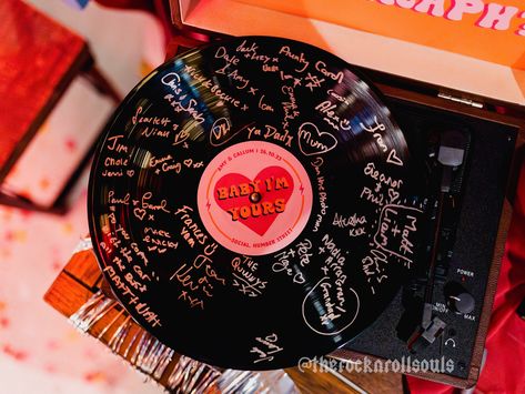 Add a unique twist to your guestbook by having your loved ones leave their names or messages on a custom vinyl record. This funky guestbook can be displayed or framed in your home as a cherished memento from your special occasion that will always make you smile. If you select the full set-up or record + sticker option please note that the vinyl record may have light scratches / scuff marks as these are rescued from landfill to help out planet! Set-Up Options: Full Set-Up: 1x Vinyl record with a Record Backdrop, Quirky Wedding Ideas, Rock And Roll Wedding, Record Sticker, Punk Rock Wedding, Weird Wedding, Custom Vinyl Record, Rock N Roll Wedding, Music Wedding