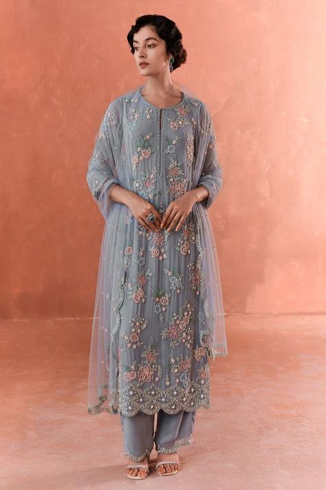 Stone blue georgette kurta with cutdana embroidery. Comes with pant and a net dupatta. Components: 3 Pattern: Embroidered Type Of Work: Cutdana Neckline: Round Sleeve Type: Three quarter Fabric: Georgette, Dupatta : Net Color: Blue Other Details:  Length : Kurta : 48 inches Pant : 40 inches Closure : Kurta - Front hook Occasion: Sangeet - Aza Fashions Summer By Priyanka Gupta, Long Kurta Designs, Kurta Pant Set, Indian Designer Suits, Engagement Style, Net Dupatta, Indian Fashion Designers, Kurta With Pants, Georgette Fabric