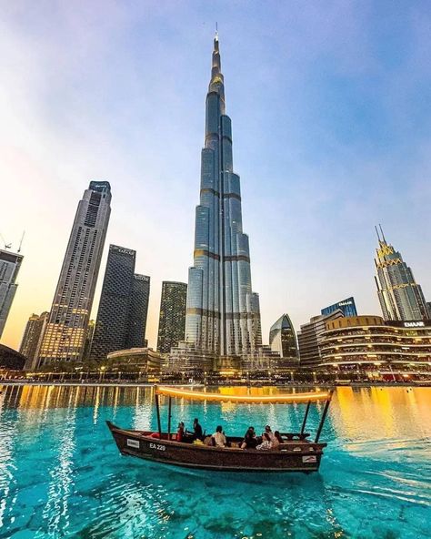 You'll never forget your first time laying eyes on the majestic Burj Khalifa Did you know you can ride around the Burj Lake in a traditional wooden boat called abra, and enjoy the stunning close up views of the Dubai Fountain show. . . . #dubaivacations ❤️ Dubai Boat Ride, Abra Dubai, Img World, Dubai Morning, Dubai Fountain Show, Atlantis Aquaventure, Fountain Boats, Ski Dubai, Dubai City Tour