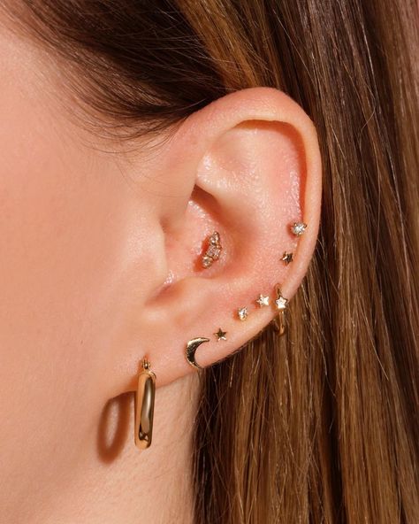 STONE AND STRAND on Instagram: “Stop in our showroom any day from 11am - 7pm for piercings, shopping, and a w(hole) lot of fun 🙌 DM @piercingsyall to make an appointment! ✨” Star Sign Ear Piercings, Celestial Ear Piercings, Celestial Star-shaped Earrings For Pierced Ears, Opal Ear Curation, Conch Piercing Stud, Gold Star-shaped Crystal Earrings For Pierced Ears, Stone And Strand, Gold Crescent Moon, Gold Everything