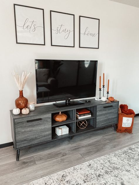 Boho Fall Decor Tv Stand, Decor Around Tv Stand Living Rooms, Simple Autumn Home Decor, Tv Stand Decor Candles, Fall Decorations Tv Stand, Fall Living Room Tv Stand Decor, Autumn Tv Stand Decor, Living Room Tv Wall Ideas Small Apartments Home Decor, Tv In Apartment Living Room